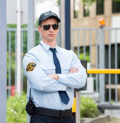 Security-Guard-Standing-Arm-Crossed-1536x1025